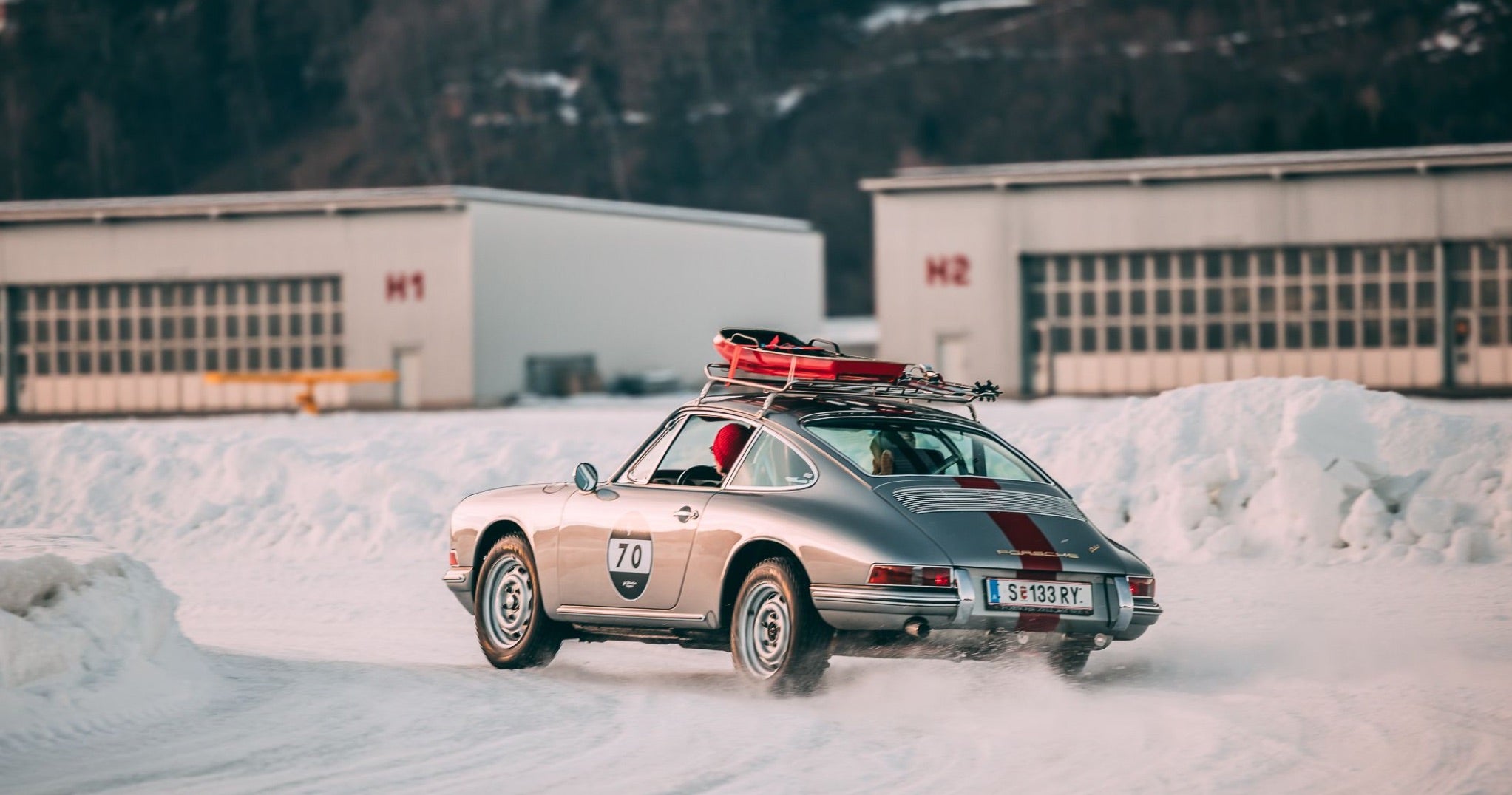 <span>Ferdi’s cousin Mark Porsche races Porsche’s 911S at the 2022 GP Ice Race</span> <br/><span class="caption-sub"><em>Photo credit: Stephan Bauer </em></span><br/>